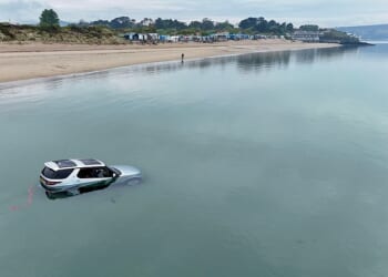 A photo taken of the hilarious incident showed almost all of the silver Land Rover Discovery submerged beneath the calm waters